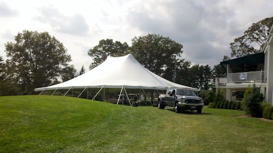 A Party Center 60 x 60 pole tent after install