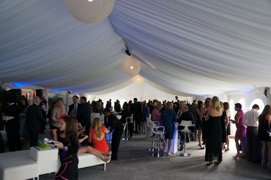 clients enjoying tented event