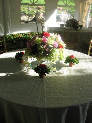 close up of 5 foot round table with floral arrangement