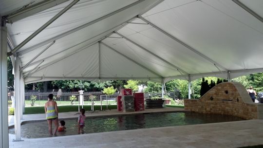 engagement party with tent over pool