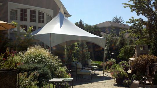 A Party Center high peak frame tent after install